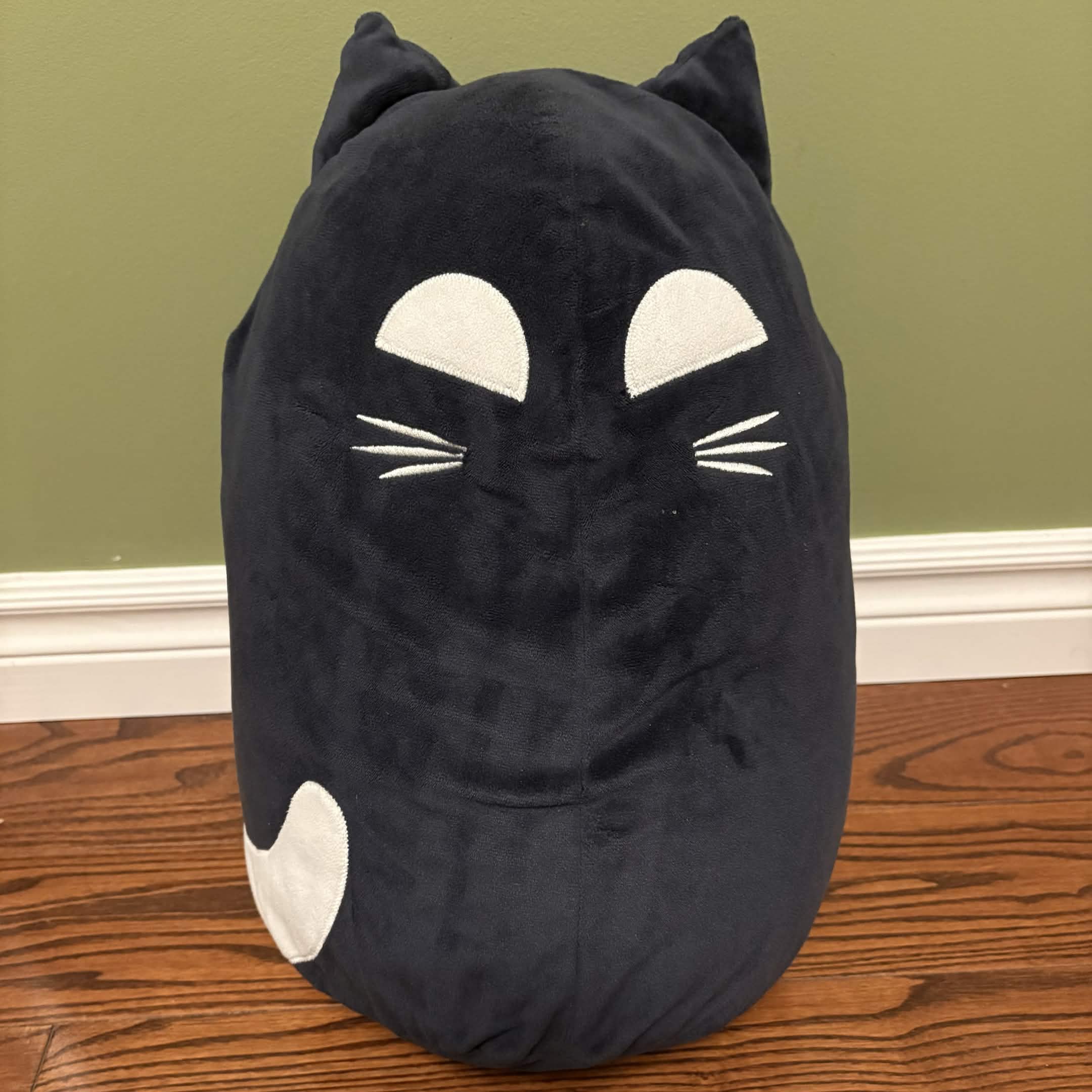 A black cat plush that I bought at IKEA when it's on sale. The actual name product: Kustfyr. Such an interesting name.